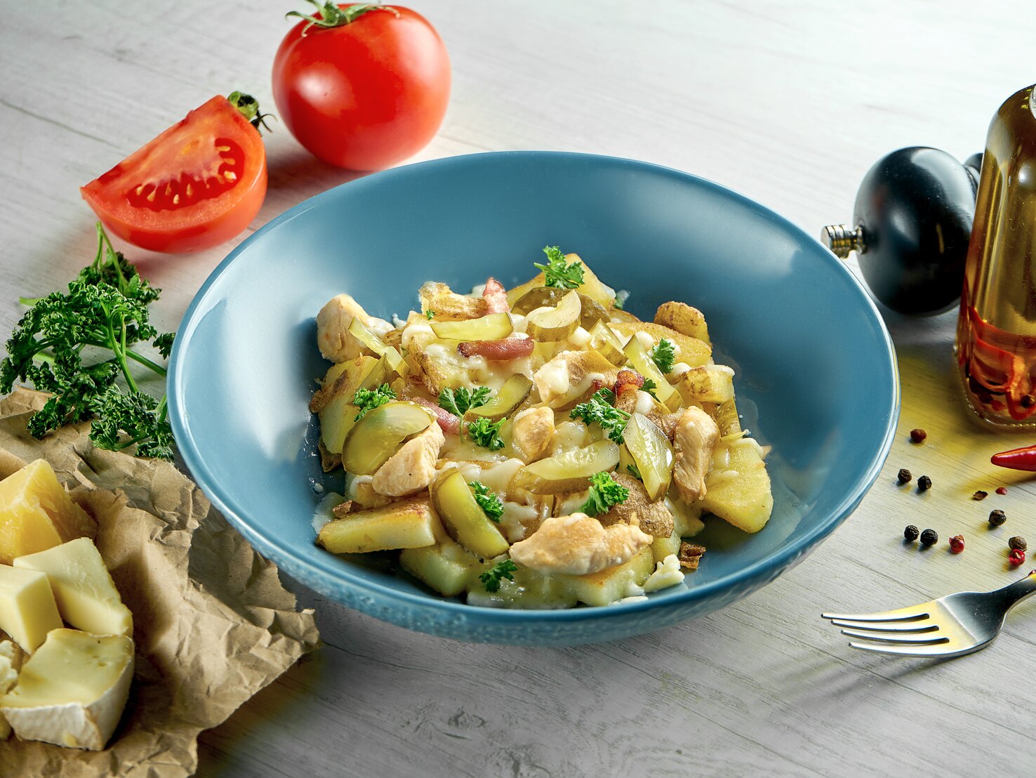 RacletteRestepfanne Fix gemacht mit Kartoffeln und Gurken