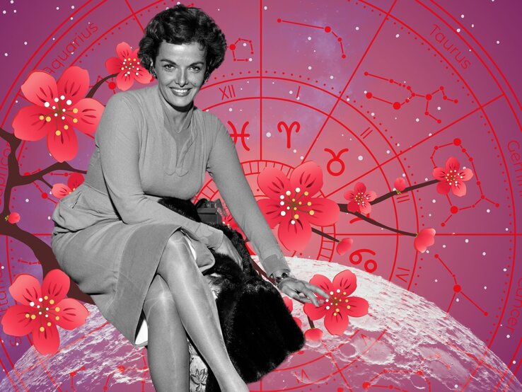 Schwarz-weißes Porträt einer Frau in Business-Kleidung mit freundlichem Blick, vor einem astrologischen Rad mit Kirschblüten – steht für beruflichen Erfolg, Ausstrahlung und astrologisch unterstützte Jobchancen.