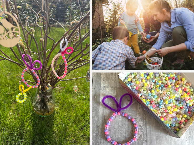 Bunter Osterstrauch in Glasvase auf grüner Wiese, geschmückt mit Perlenanhängern in Hasenform und Papierdeko im warmen Frühlingslicht.